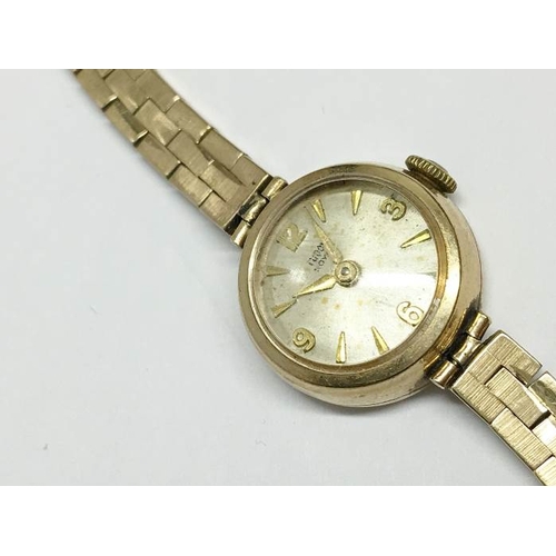 1396 - A Rudor Royal ladies wrist watch made by Rolex, all gold cased, 17.9gms, working