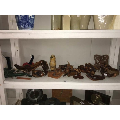 100 - A quantity of assorted wooden items including cork screw, wine rack etc