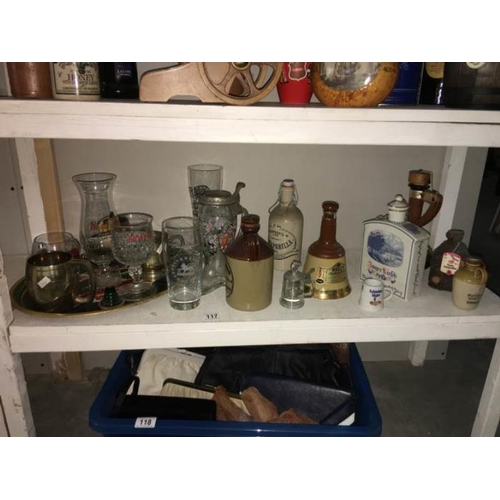 117 - A quantity of alcohol bottles some with contents