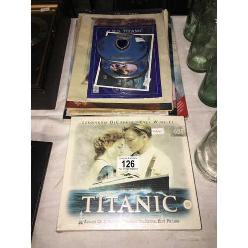 126 - A quantity of Titanic film related items including stamps, trinket box etc