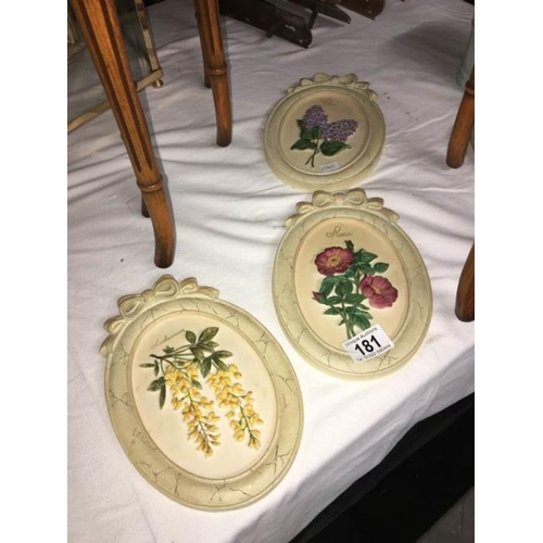 181 - 3 ornamental wall plaques of flowers