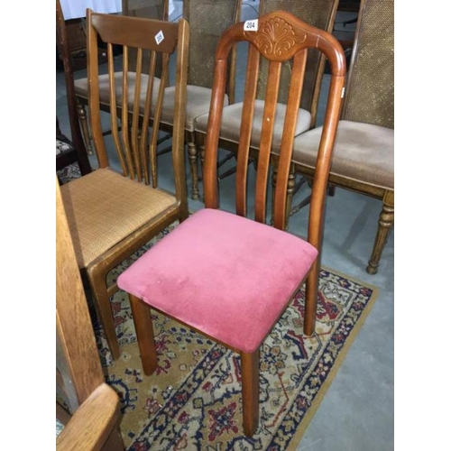 204 - A mahogany high back chair with carved decoration