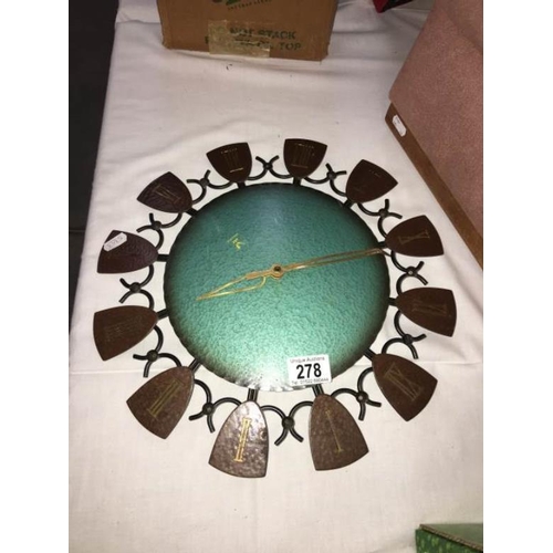 278 - A metal Jaz electric wall clock