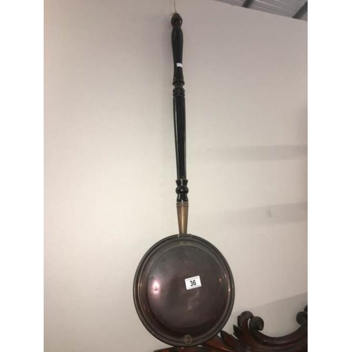 36 - A copper warming pan