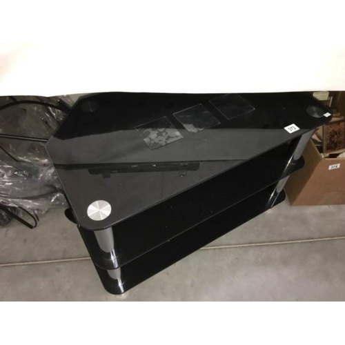 373 - A glass TV stand