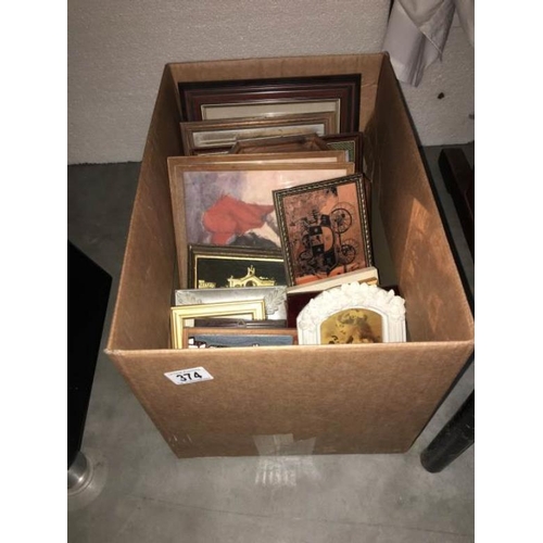 374 - A box of pictures etc