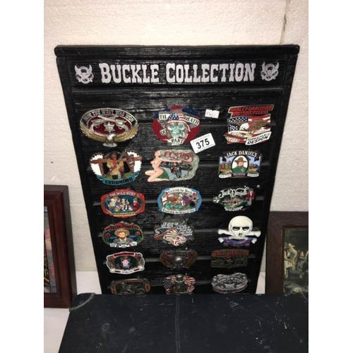 375 - A mounted buckle collection including Jack Daniels