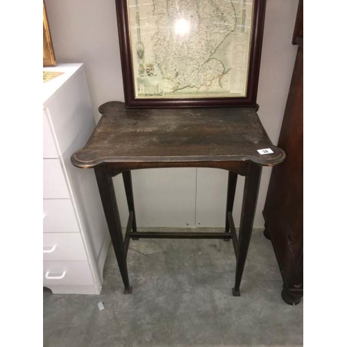 38 - A small dark wood hall table