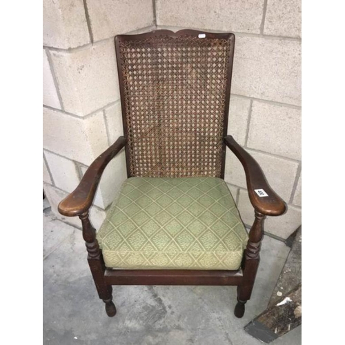 400 - A bergere backed chair