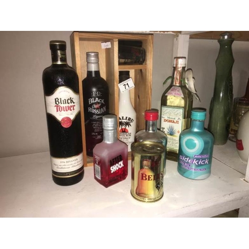 71 - A quantity of bottles including Black Tower and Malibu