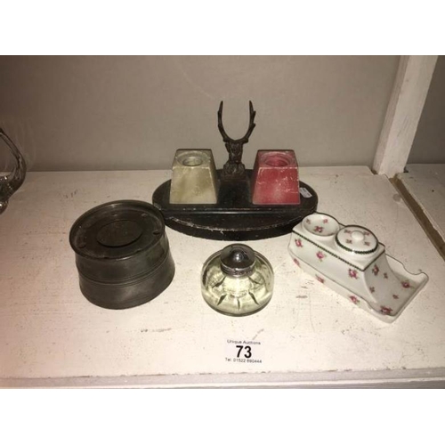 73 - Unusual inkwells including pewter, marble glass