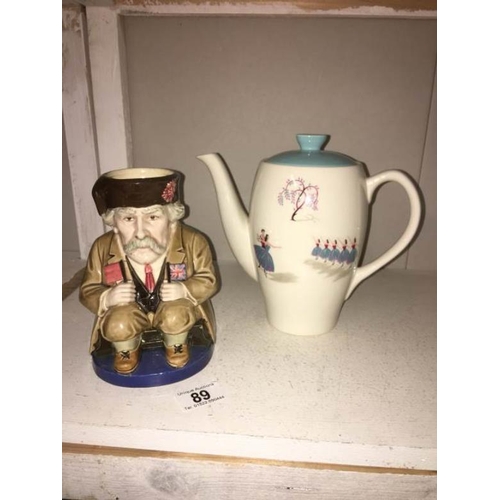 89 - A Beswick Pavlova coffee pot and a character jug of Montgomery