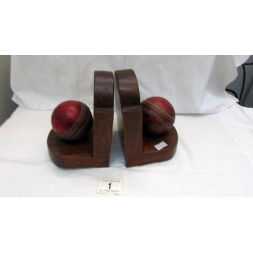 1 - A pair of cricket ball bookends (balls from Middlesex cricket club, 1930's)