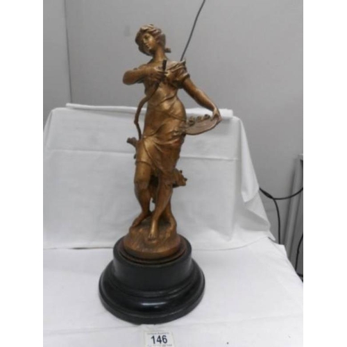 146 - An attractive gilt art nouveau figure of a lady on ebonised base