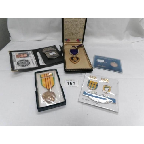 161 - A collection of replica USA medals including Purple Heart