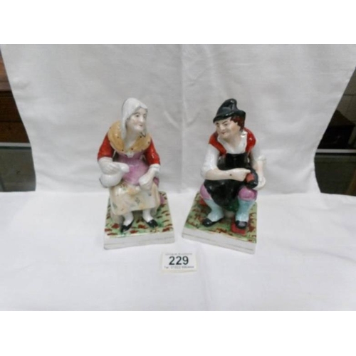 229 - A pair of Staffordshire figures 'Jebson & Nell' circa 1850