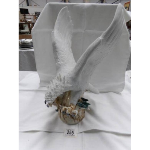 255 - A ceramic eagle figure