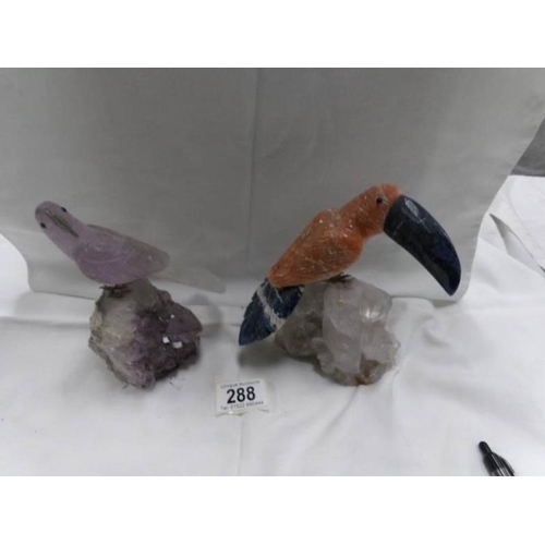 288 - An amethyst parrot and a carved stone toucan