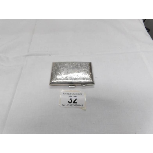 32 - A silver cigarette case