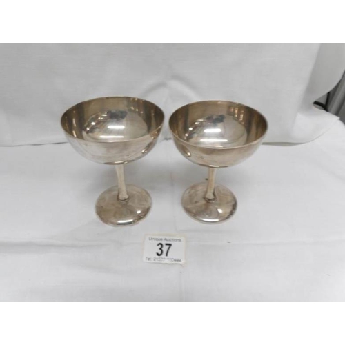 37 - A pair of silver goblets