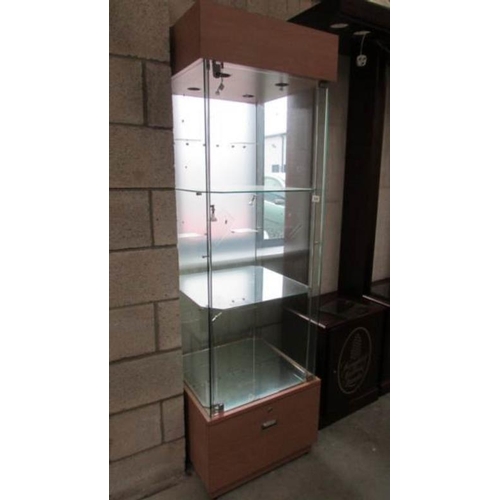 539 - A glass shop display cabinet with light