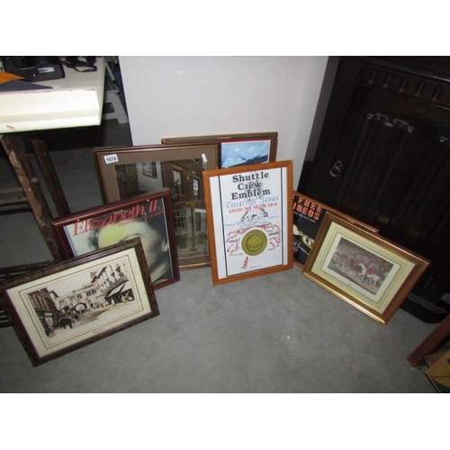 1014 - A mixed lot of framed and glazed prints and advertisements