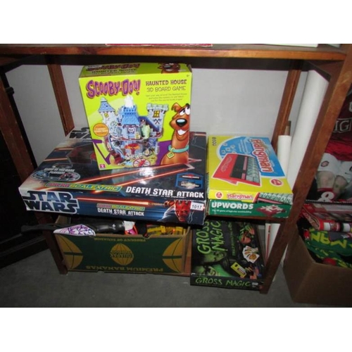 1017 - A mixed lot of various children's toys and games including Star Wars, Scalextric etc