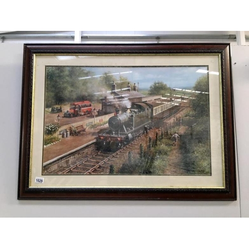 1029 - A framed and glazed steam train print