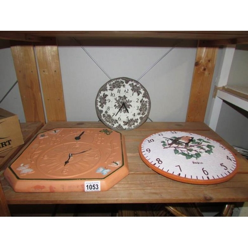 1053 - 2 garden wall clocks and one other