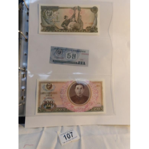 107 - An album of approximately 20 uncirculated and high quality bank notes