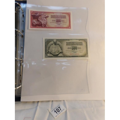 107 - An album of approximately 20 uncirculated and high quality bank notes