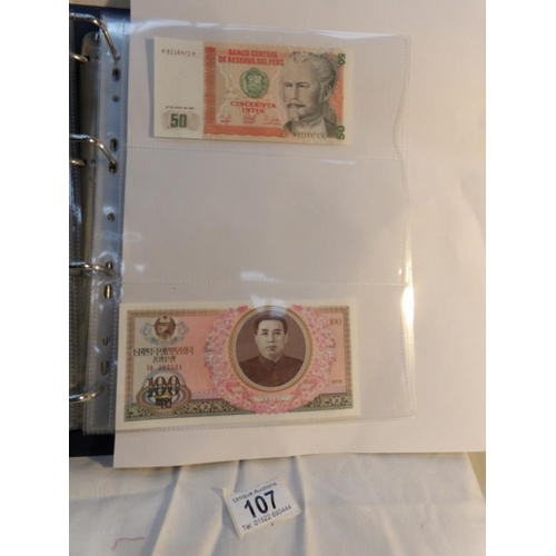 107 - An album of approximately 20 uncirculated and high quality bank notes