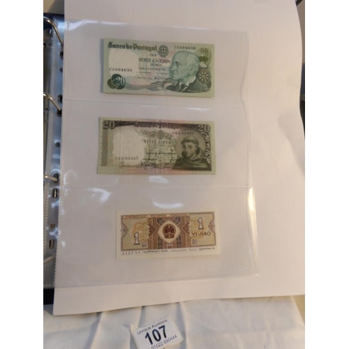 107 - An album of approximately 20 uncirculated and high quality bank notes