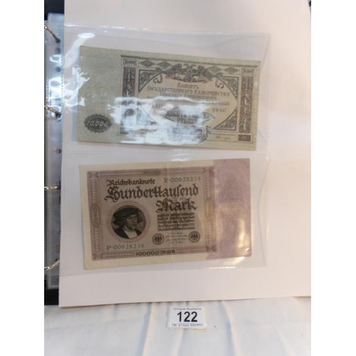 122 - An album of approximately 60 uncirculated and high quality world bank notes