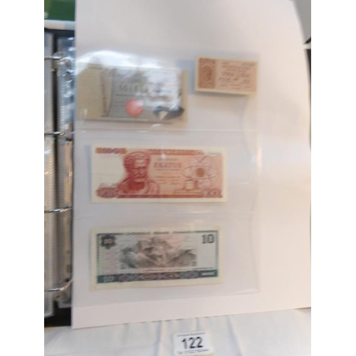 122 - An album of approximately 60 uncirculated and high quality world bank notes