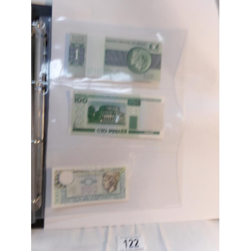 122 - An album of approximately 60 uncirculated and high quality world bank notes