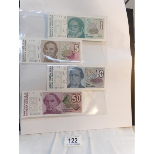 122 - An album of approximately 60 uncirculated and high quality world bank notes