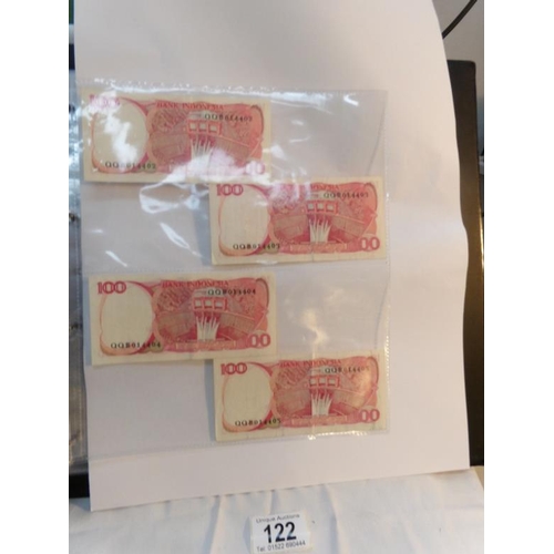 122 - An album of approximately 60 uncirculated and high quality world bank notes