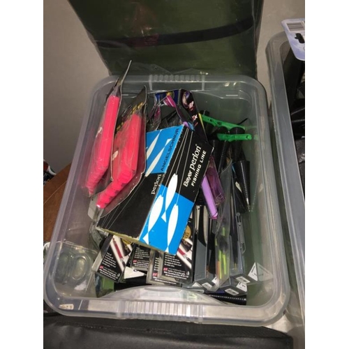 296 - A quantity of fishing tackle and related items including floats, cases etc