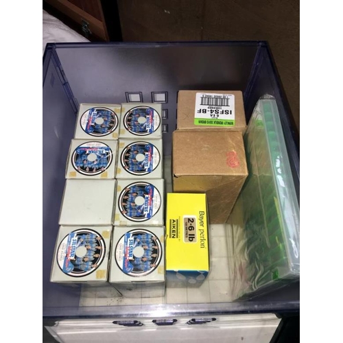 301 - A large quantity of fishing tackle including weights, line, Daiwa real cases etc