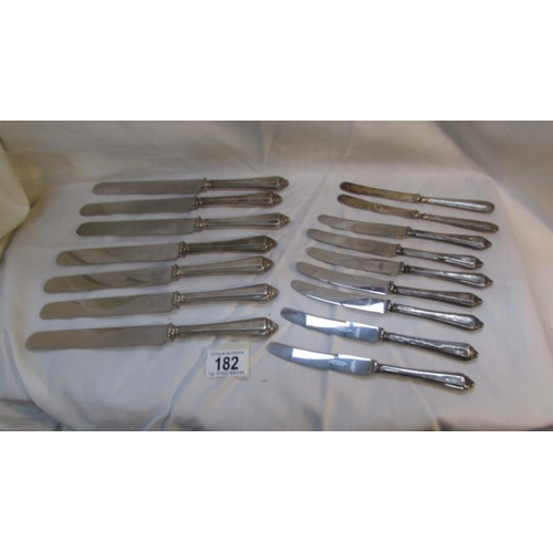 182 - 16 silver handled knives