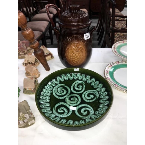 324 - 2 items of west German pottery being a green bowl and a 'Rumtopf' lidded jar