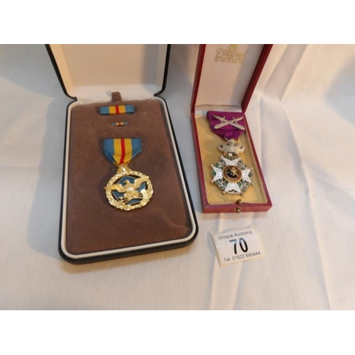 70 - A United States of America Defence Distinguished Service medal and one other