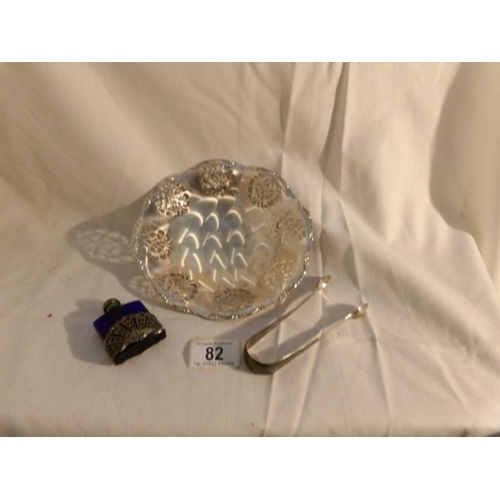 82 - A pair of silver sugar nips, A Quist bowl and a perfume bottle