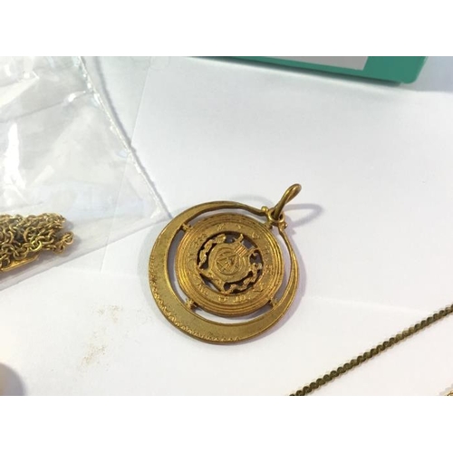 180E - A gold metal Masonic pendant, 9ct gold chain with small diamond etc.