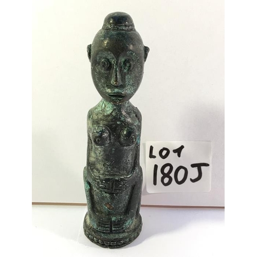 180J - A small figure of a native