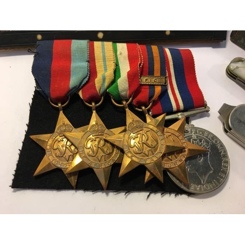 180K - A set of WW2 medals consisting of 1939-45 star, Africa star, Italy star, Burma star with Pacific bar... 