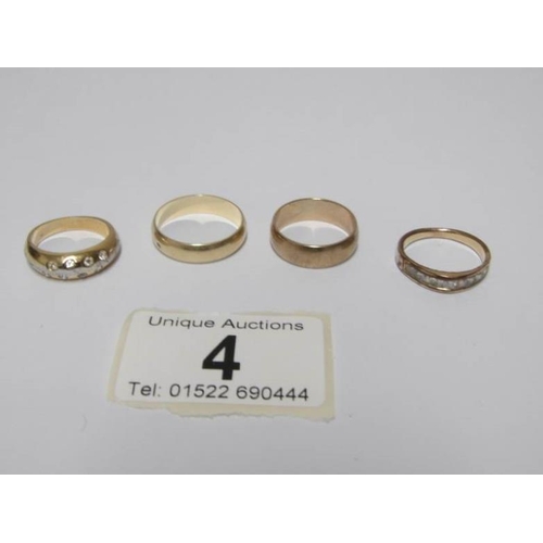 4 - 2 9ct gold wedding bands and 2 yellow metal rings