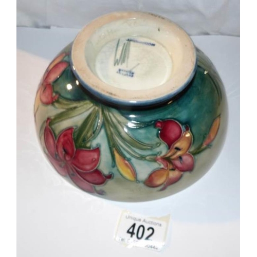 402 - A William Moorcroft freesia 7.5'' diameter bowl, 1930's, signed W M in green