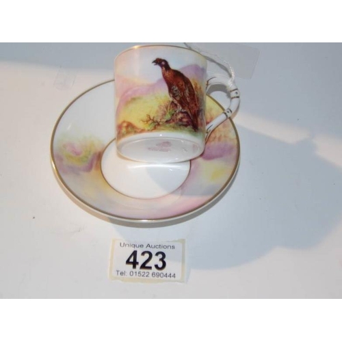 423 - A Royal Worcester James Stinton hand painted coffee can and saucer 'Game Birds'

No damage or restor... 